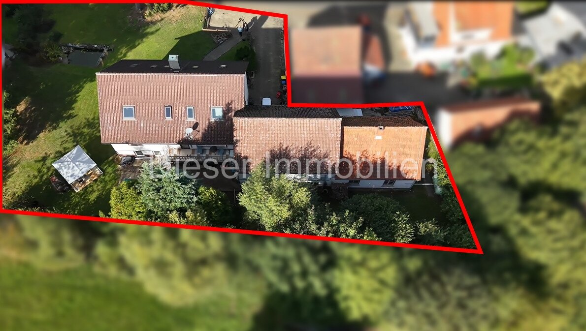 Vielseitiges Wohn- und Gewerbeobjekt mit Hallen & Werkstatt in naturnaher Lage 